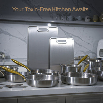 Titanium cookware set on a kitchen counter with text 'Your Toxin-Free Kitchen Awaits...'.